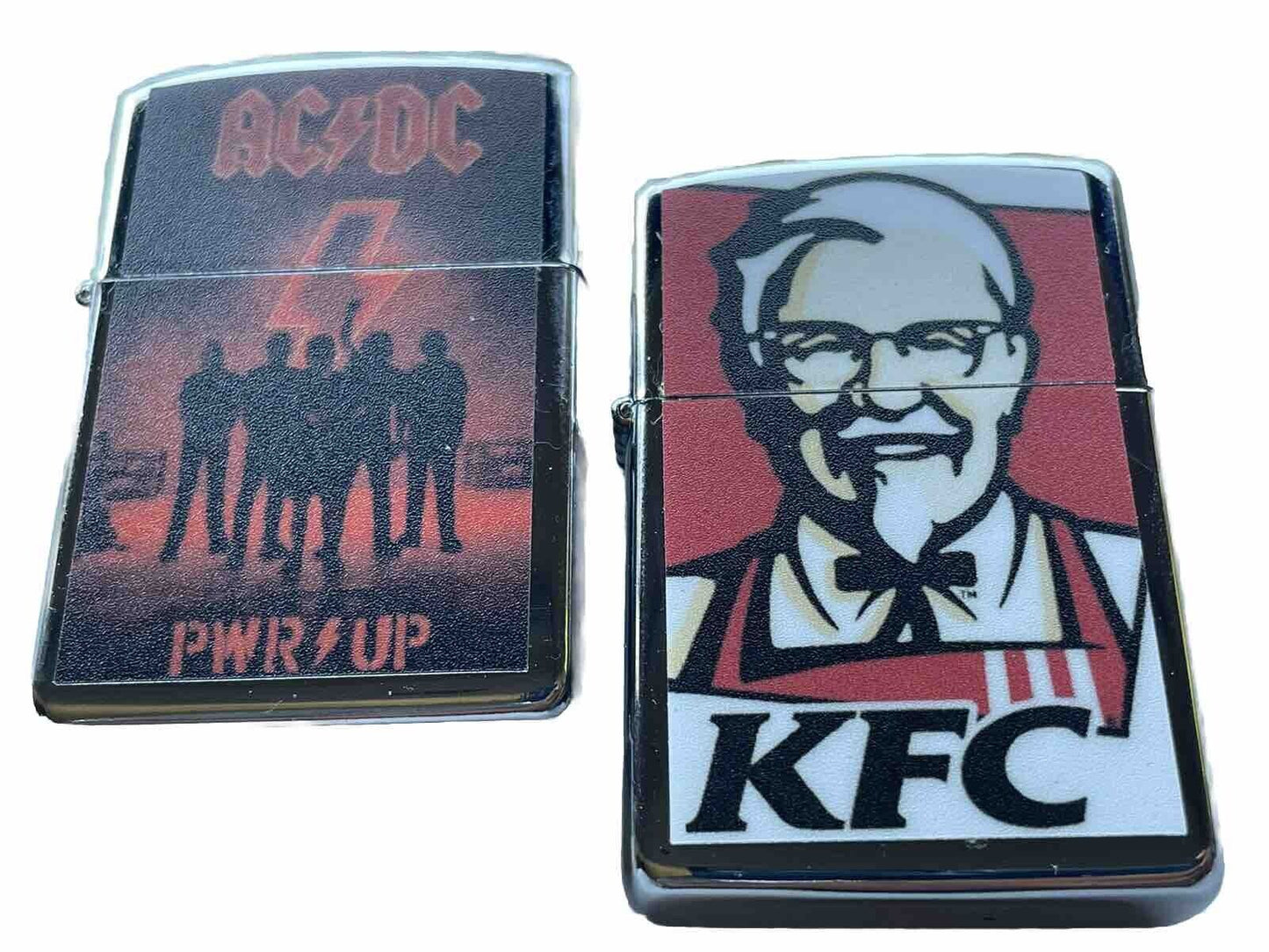 2 PCs Windproof Oil Lighters Set KFC And AC DC Band Designs Novelty Gift
