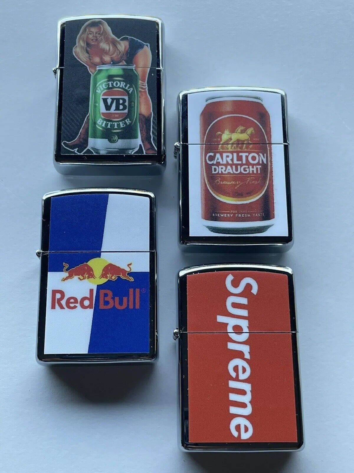 4 PCs Windproof Oil Lighters Set Supreme Red Bull VB And Carlton Draught Beers