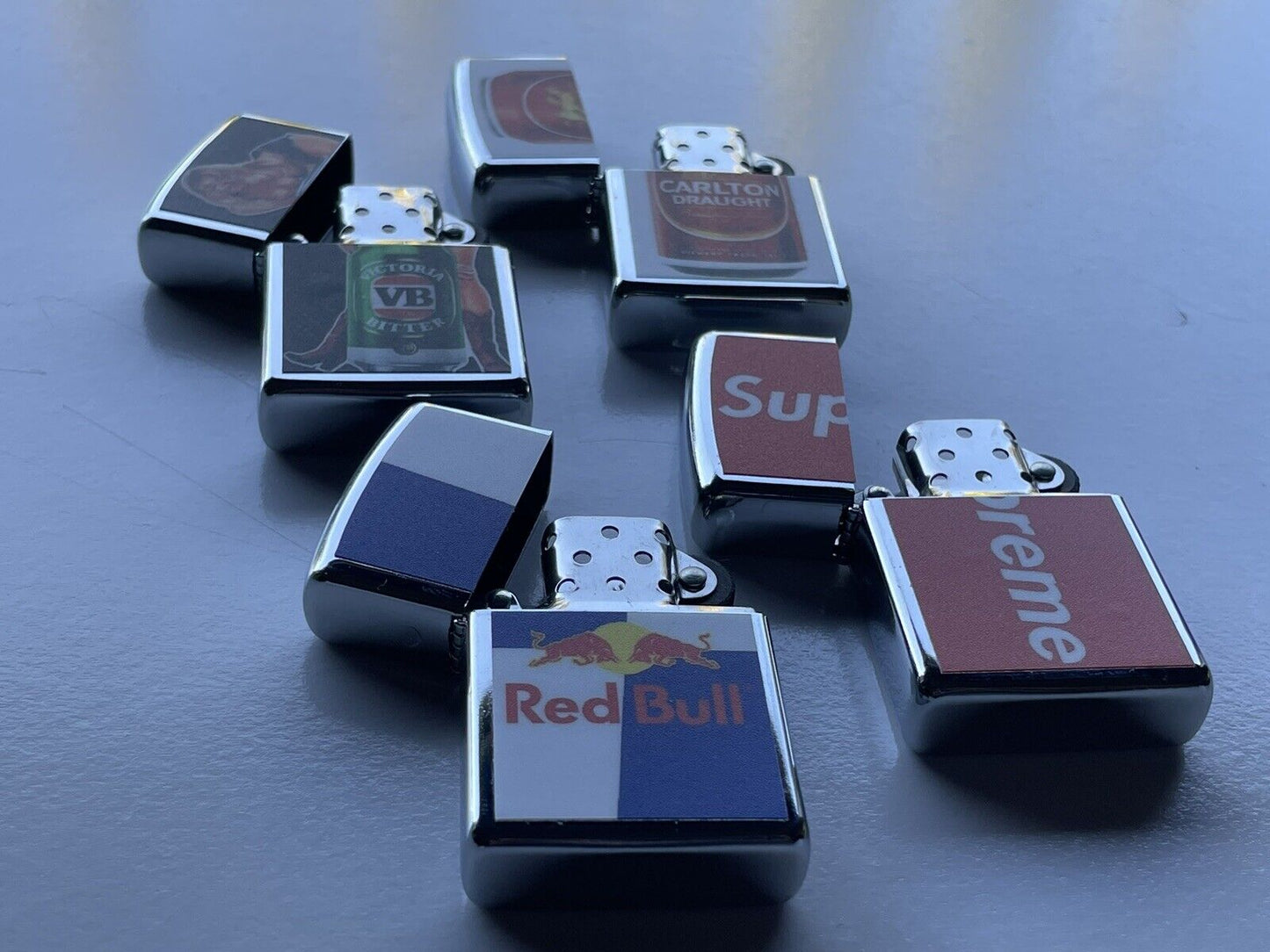 4 PCs Windproof Oil Lighters Set Supreme Red Bull VB And Carlton Draught Beers
