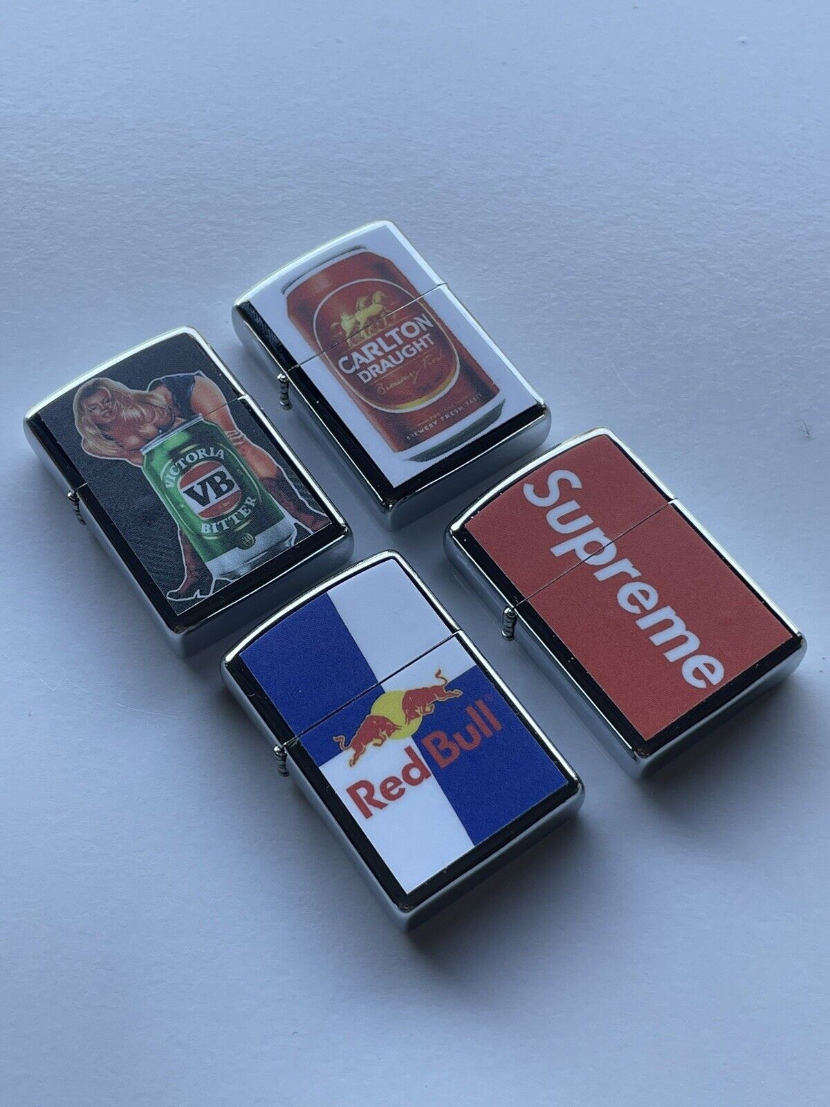4 PCs Windproof Oil Lighters Set Supreme Red Bull VB And Carlton Draught Beers