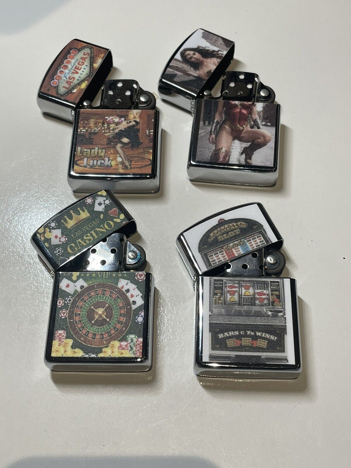 4 PCs Windproof Oil Lighters Las Vegas Casino Nevada Pokies Wonder Woman Design