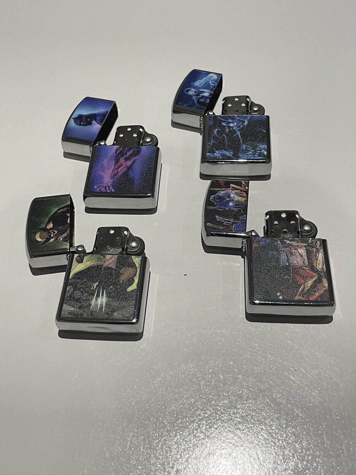 4 Pcs Windproof Oil Lighter Wolverine Thor Blk Panther Transformer