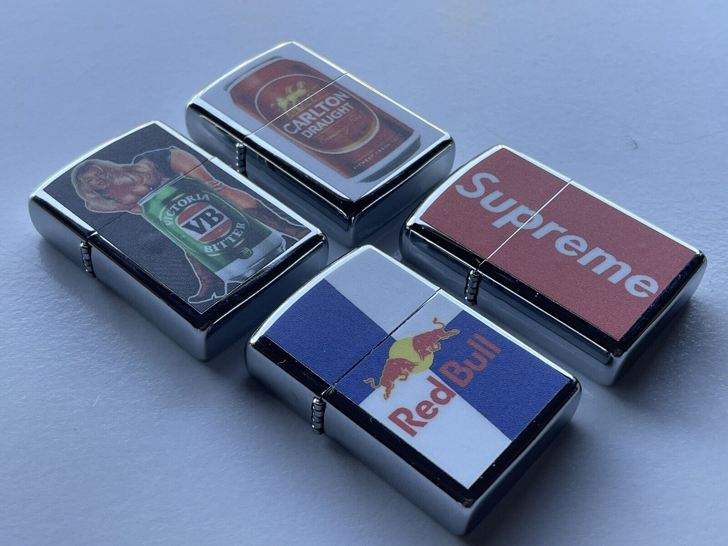 4 PCs Windproof Oil Lighters Set Supreme Red Bull VB And Carlton Draught Beers